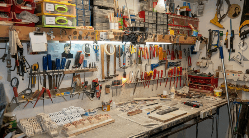 Best woodworking tools for small spaces: picture of a cluttered garage space.